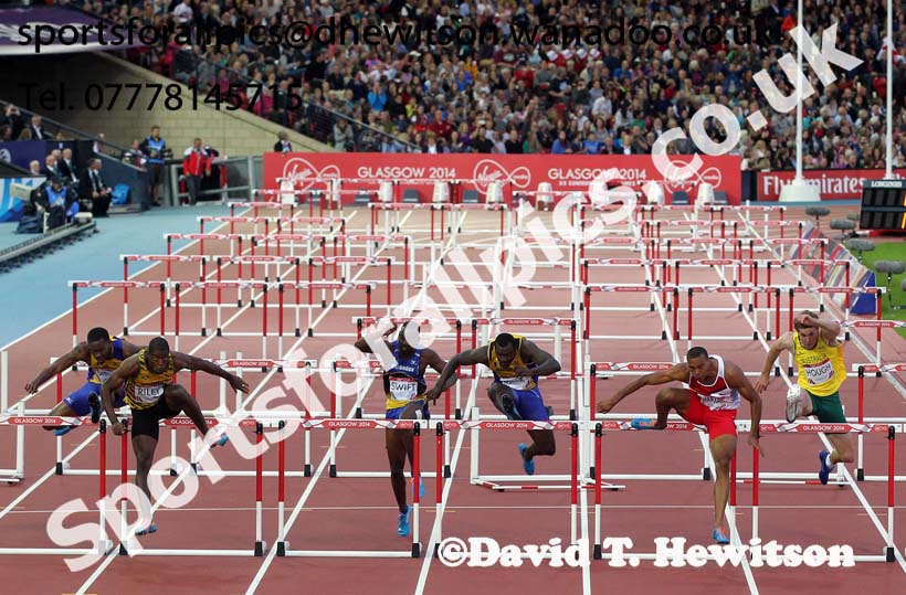 Andrew Riley (Jamaica) wins the 110 metres hurdles from Will Sharman (England) at the Commonwealth Games, Glasgow. Photo: David T. Hewitson/Sports for All Pics